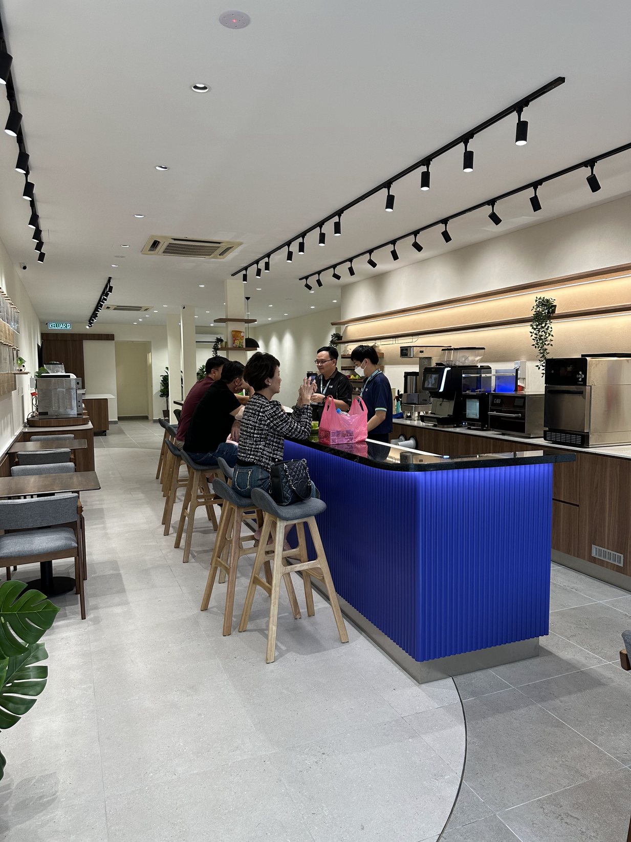 SCC Experience Store café counter and customer seating